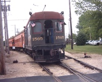 Click image to view full size still of IT 1565 and train